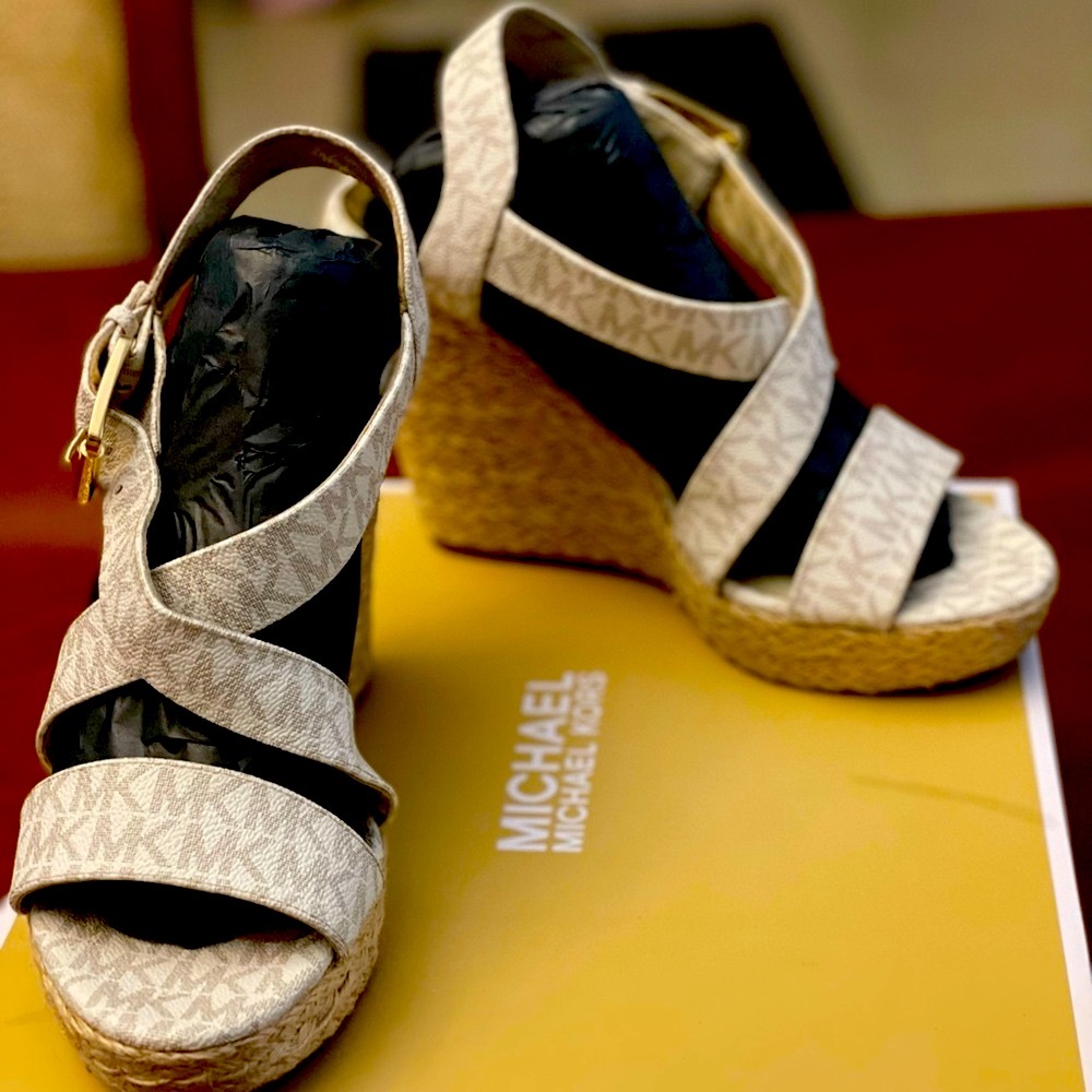 9.5 Michael Kors off white monogram wedge heels.  Excellent Condition